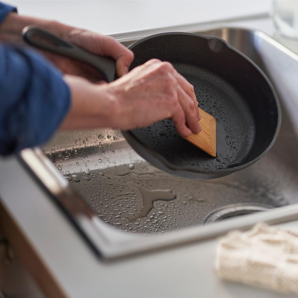 Bambu pot scraper multipurpose-use versatile for bowls, pans, and counters.