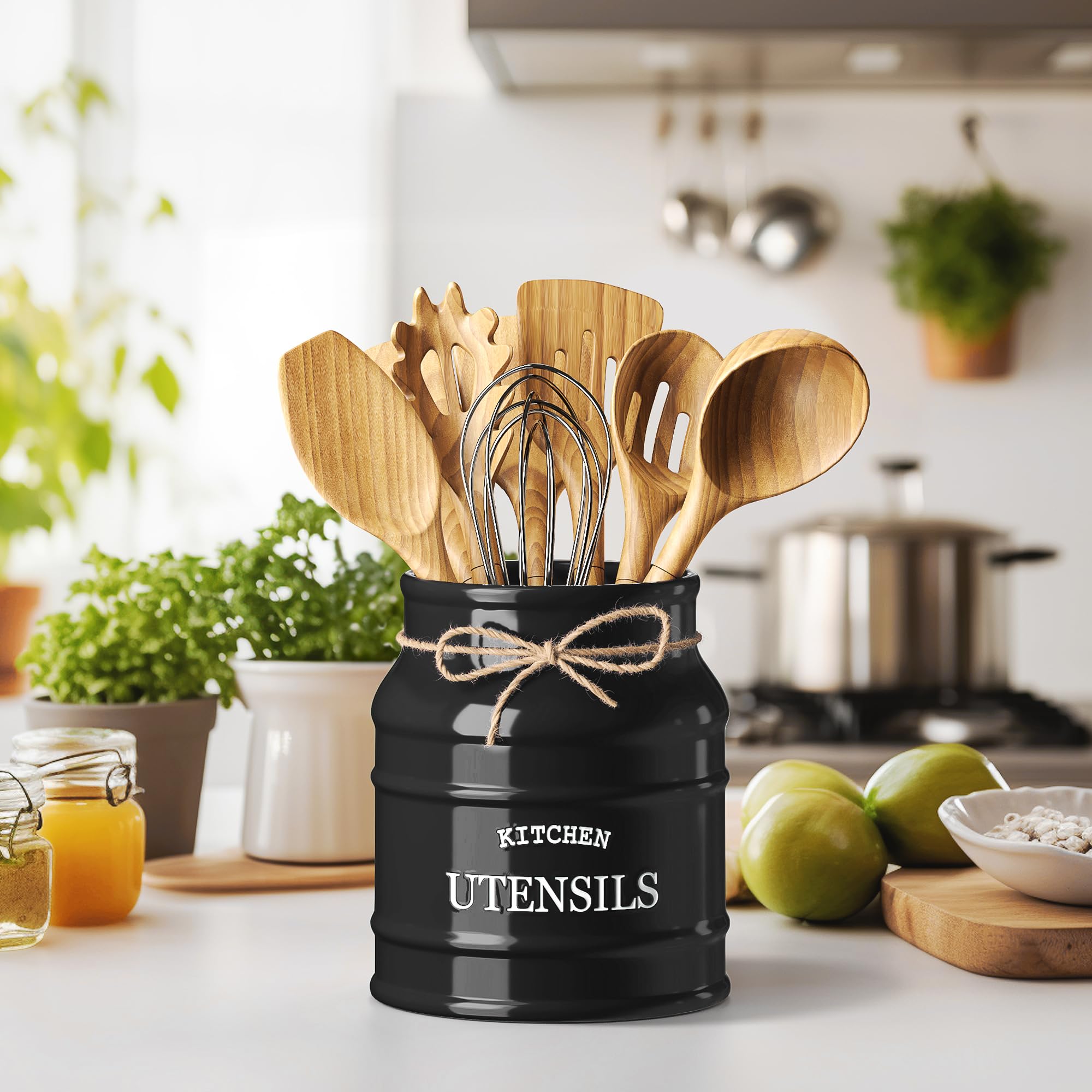 Barnyard Designs black utensil crock on counter keeps spoons and spatulas within reach.