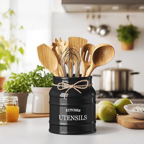 Barnyard Designs black utensil crock on counter keeps spoons and spatulas within reach.