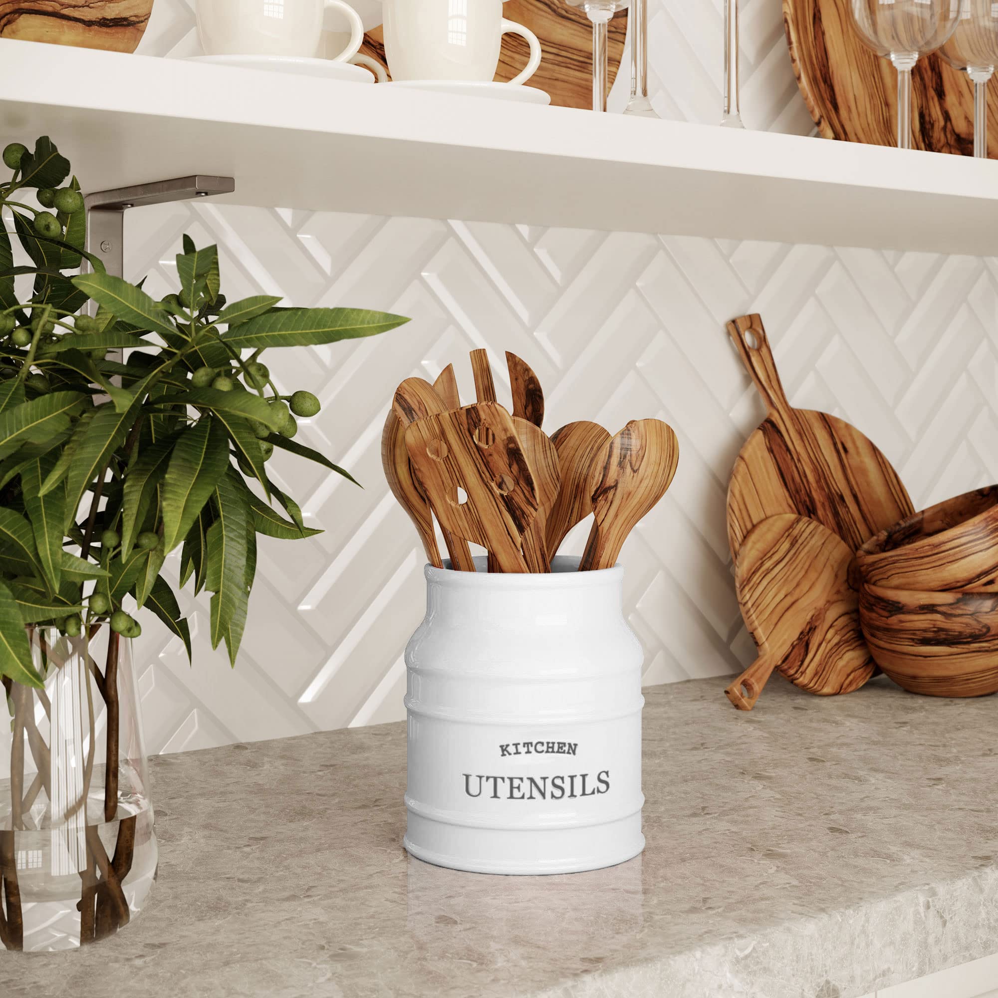 Barnyard Designs keeps spoons, whisks, and knives neatly stored in the crock