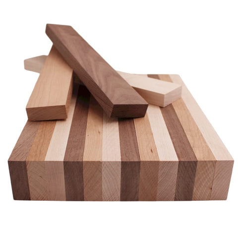 Barrington Hardwoods walnut boards close-up showing rich grain for durable cutting surfaces.