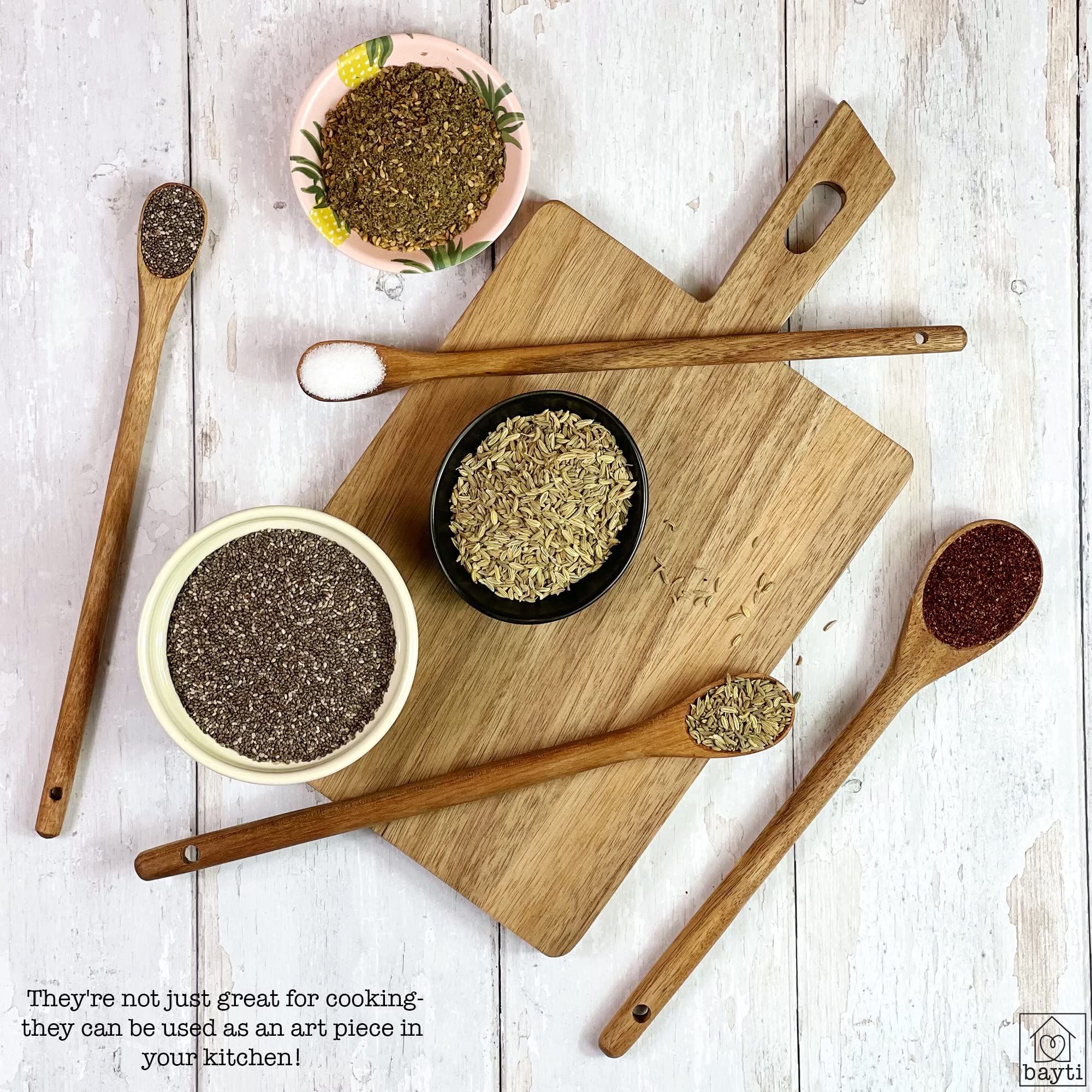 Bayti acacia wood measuring spoons set of four for versatile kitchen use.