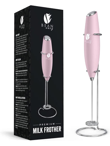 Bean Envy Milk Frother pink stand shown for easy storage and quick frothing at home.