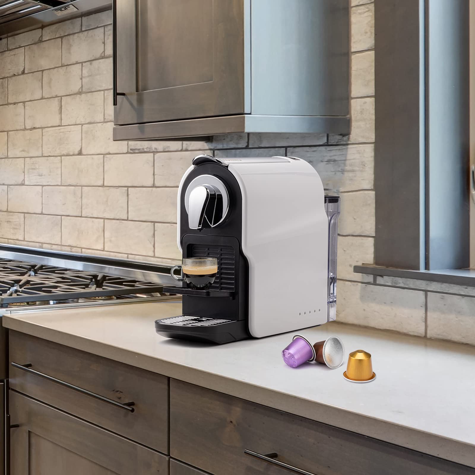 Beanglass machine features a removable drip tray and used pods container for quick cleanup.
