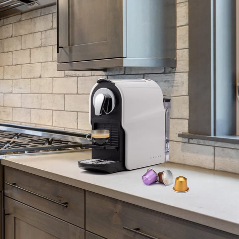 Beanglass machine features a removable drip tray and used pods container for quick cleanup.