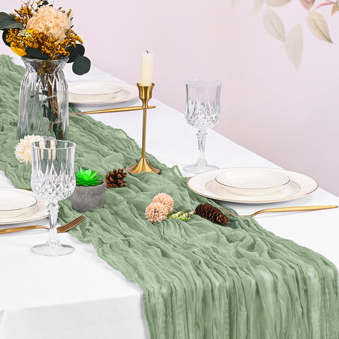 Beautane Sage Green Cheesecloth Table Runner shown in natural light for color and drape
