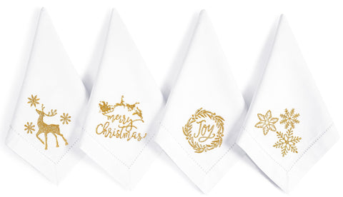Bedding Craft napkins with gold embroidery on crisp white fabric for refined table settings
