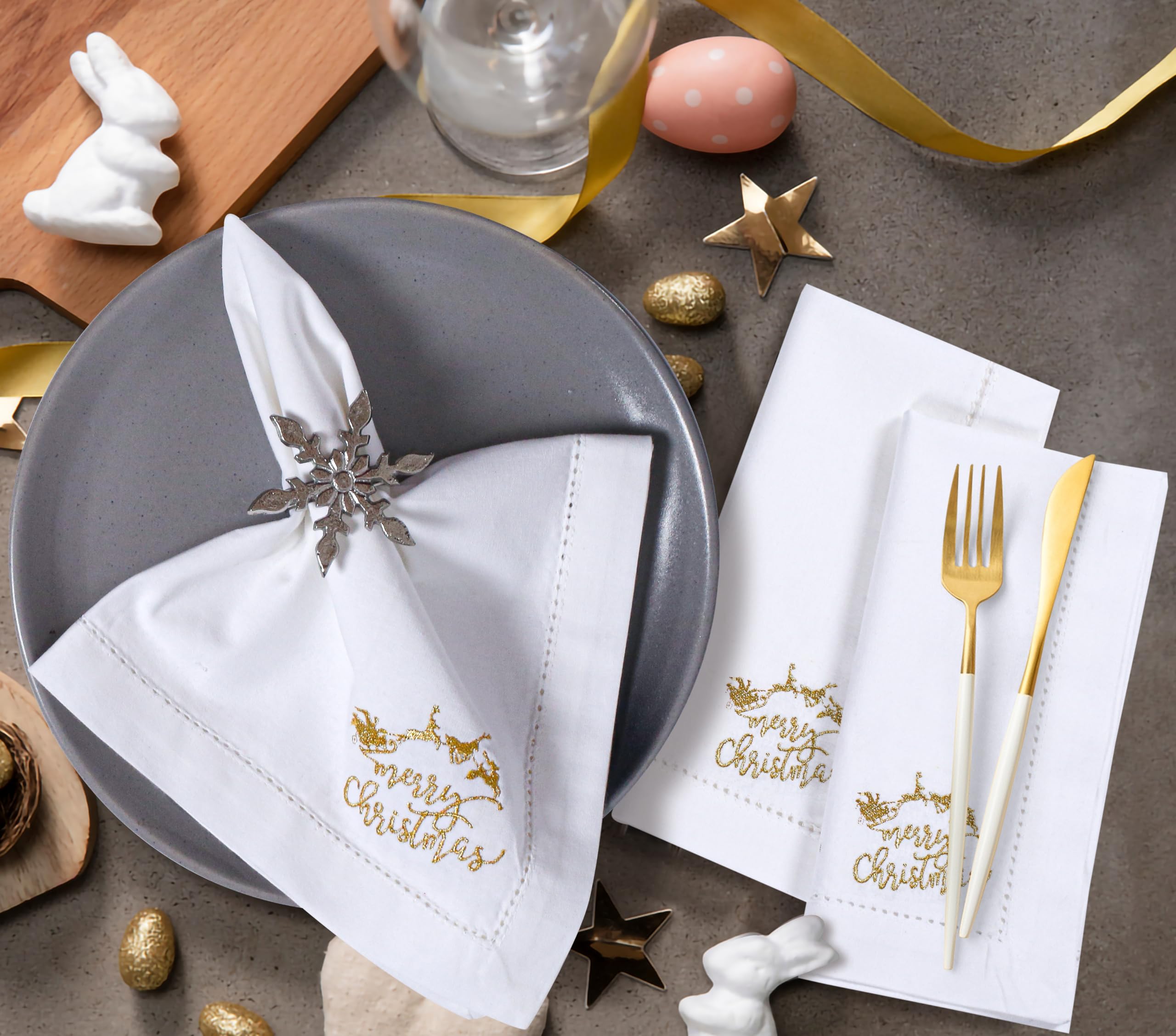 Bedding Craft wedding-table setup with 18x18 white napkins and gold details