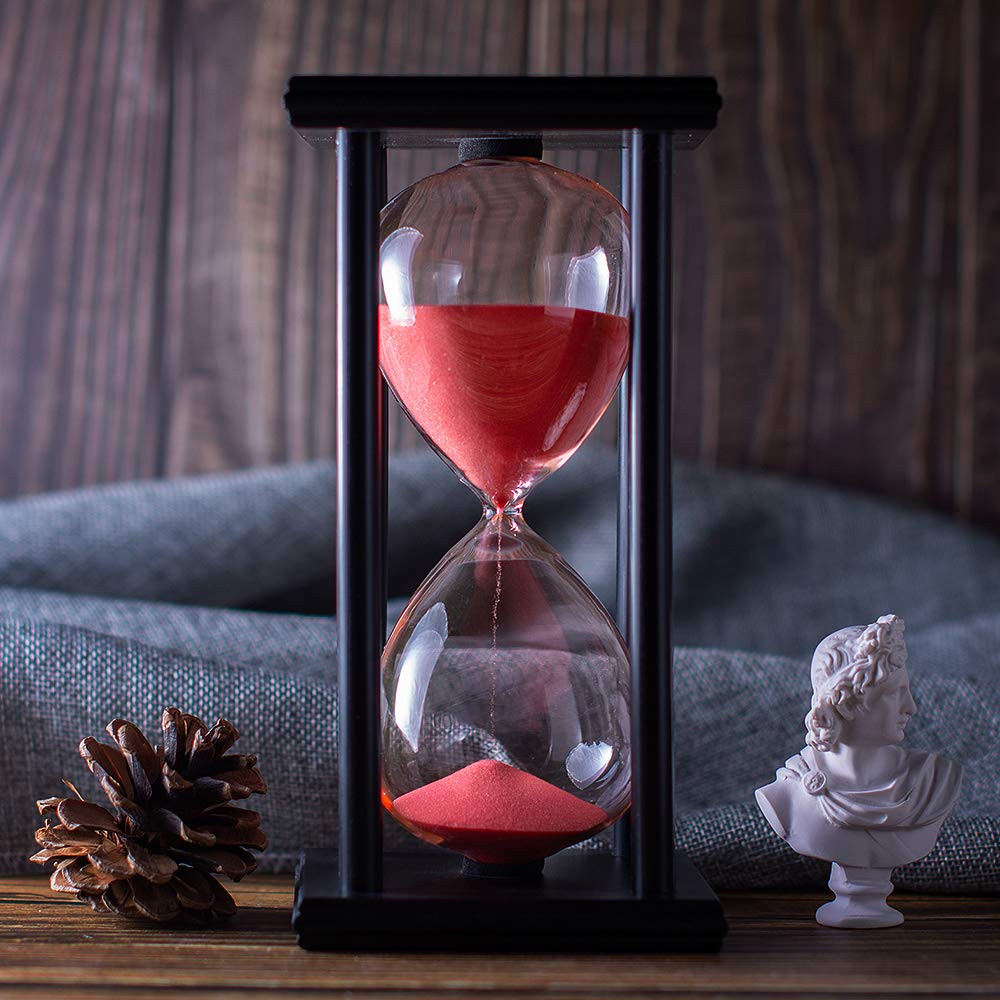 BELLAWARE red sand flowing inside glass timer for calm work sessions.