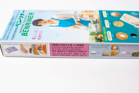 Benriner mandolin slicer – precise julienne and slice results for salads.