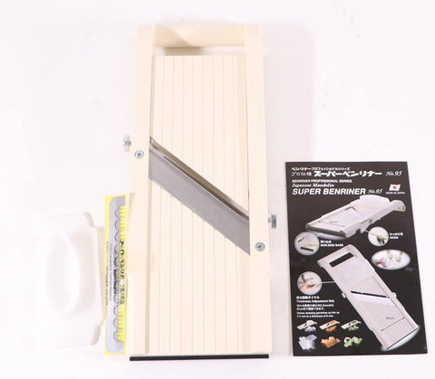 Benriner beige slicer with coarse-tooth blade for chunky cuts like fries.