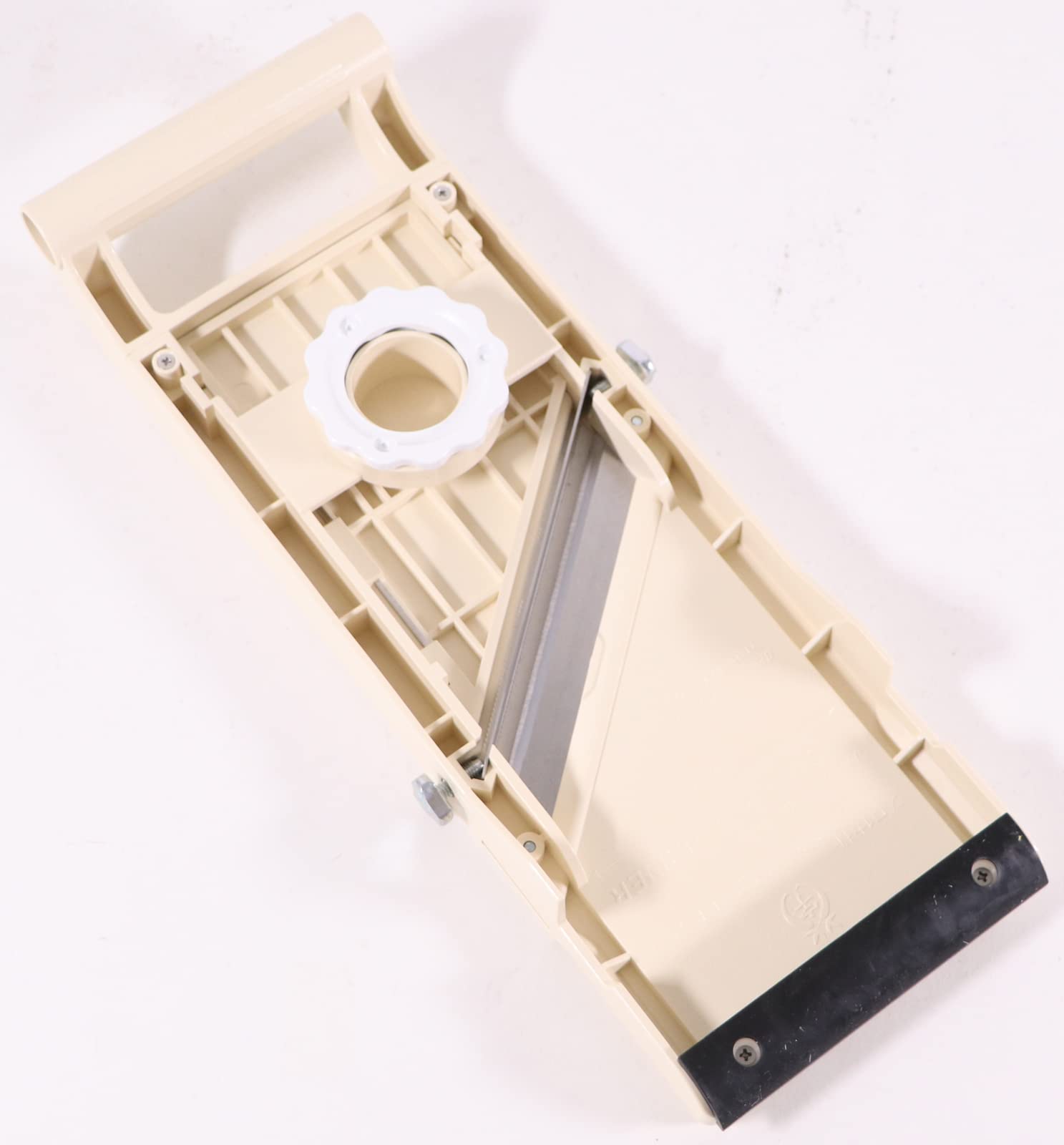 Benriner beige slicer with fine-tooth blade for ultra-thin julienne noodles.