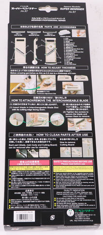 Benriner beige slicer with safety guard protecting fingers during prep.