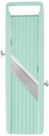 Benriner vegetable slicer green blade close-up highlighting sharp, precise cuts