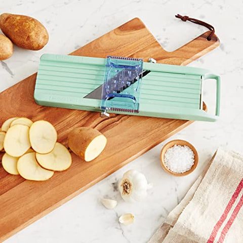 Benriner vegetable slicer green in-use kitchen scene for efficient prep