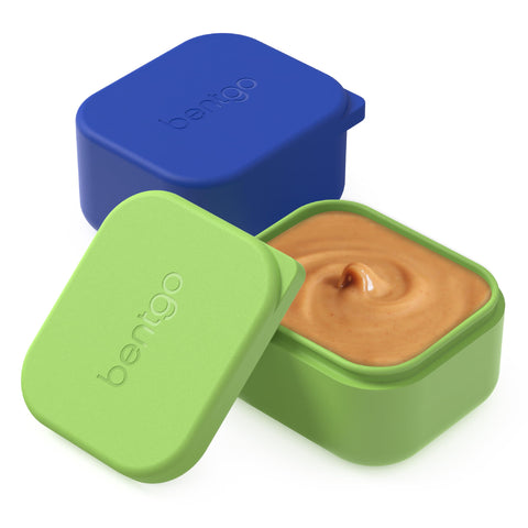 Bentgo Sidekicks blue dipping cup for sauces inside lunch boxes.