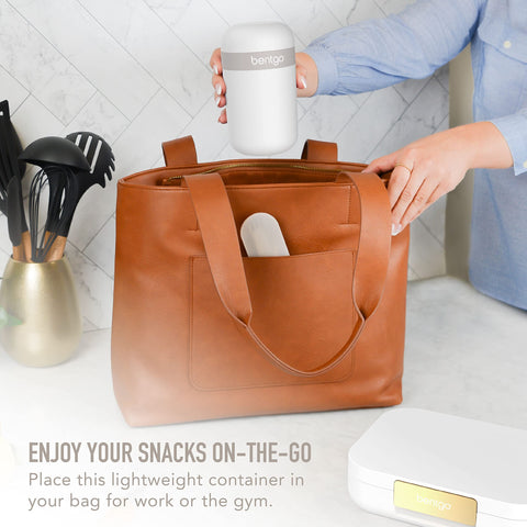 Bentgo Snack Cup dual-sealing lid keeps foods separated during travel.