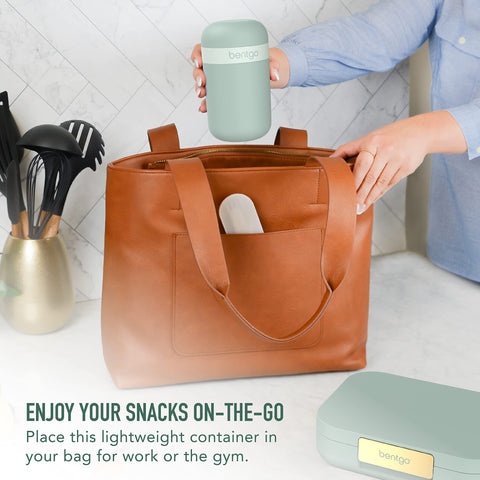 Toppings compartment attached to base for separate snacks and flavors.