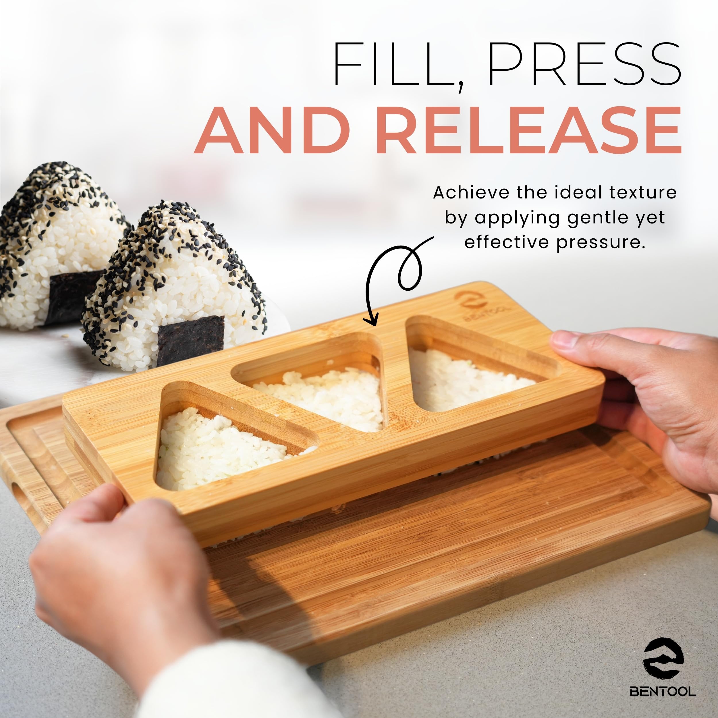 BENTOOL medium bamboo onigiri mold close-up highlighting sustainable bamboo and natural finish.