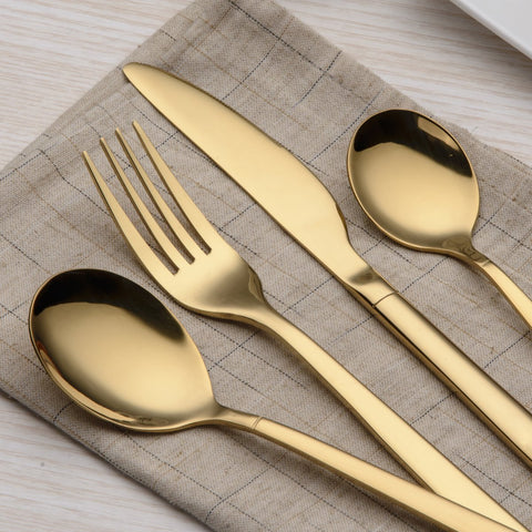 Berglander dinner knife edge close up highlights refined curve.
