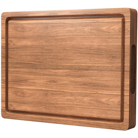 BETOLEAN acacia cutting board with deep juice grooves for tidy meat prep.