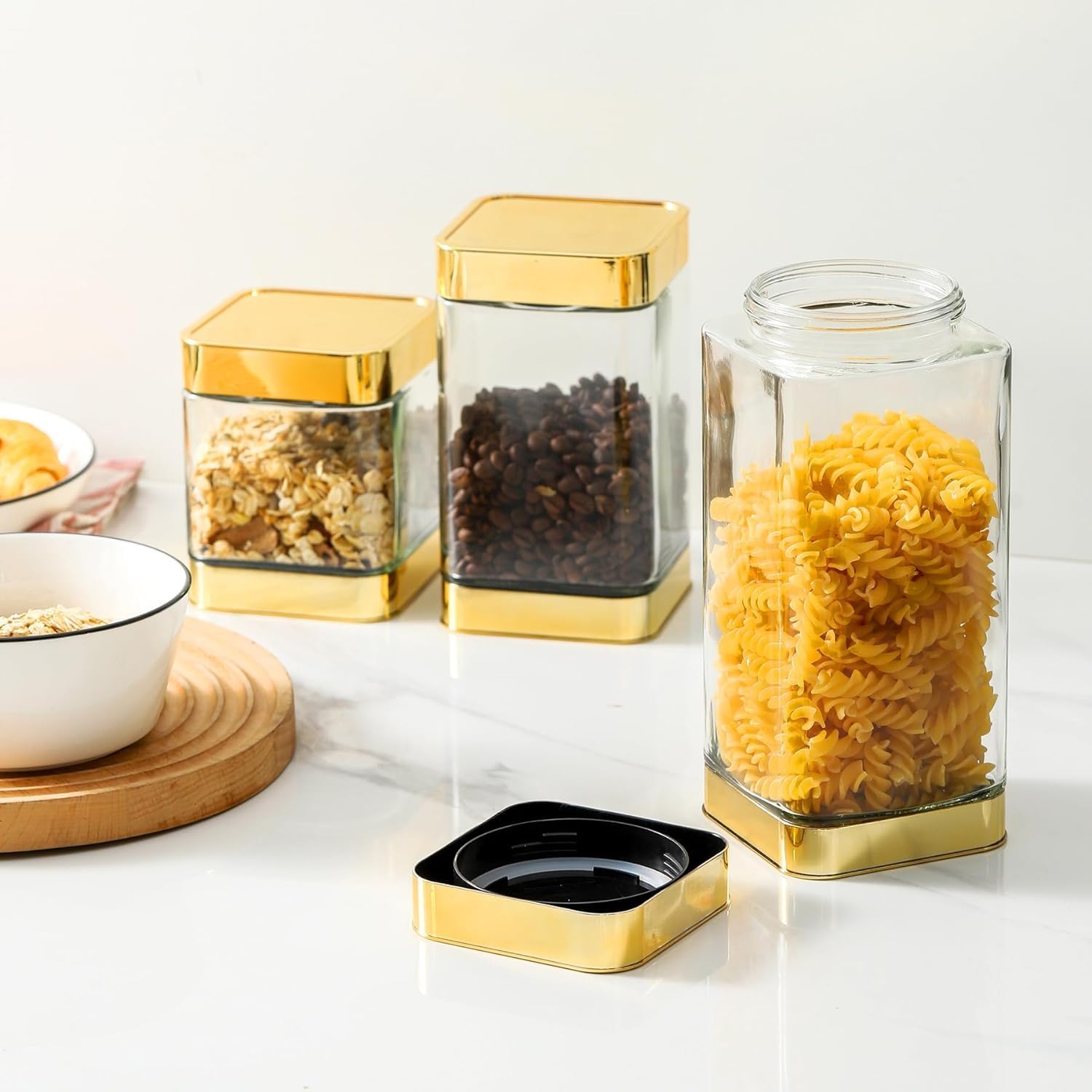 BETTWILL glass storage jar for tea leaves with stylish gold accents