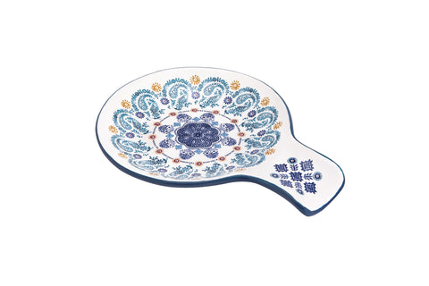 Bico Blue Talavera spoon rest on counter; keeps utensils tidy and ready.