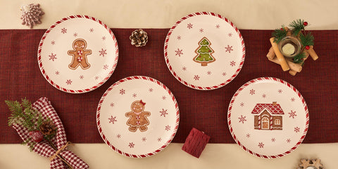 Bico set of four ceramic plates arranged for salads and desserts.