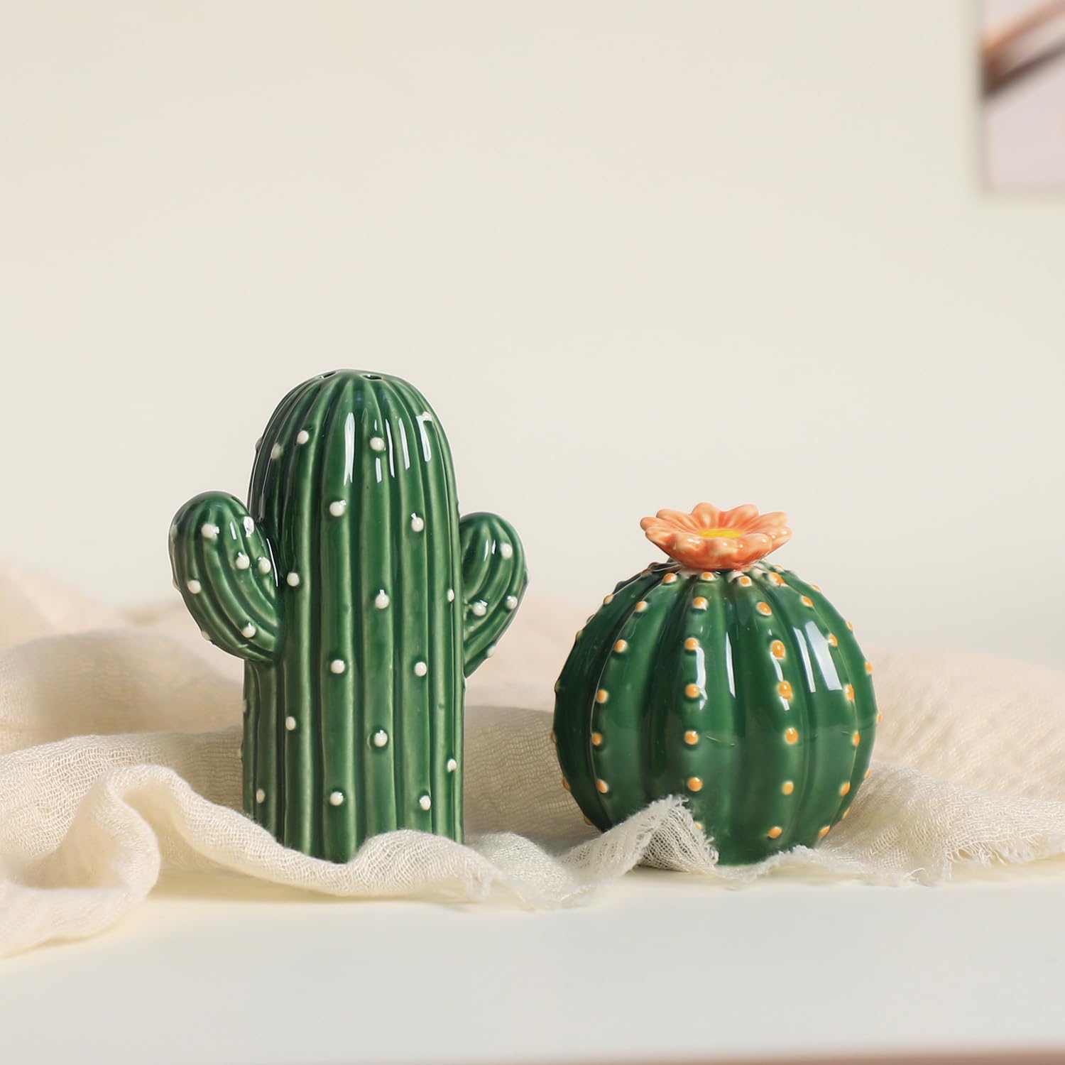 Bicuzat hand-painted cactus salt pepper detail highlighting artisanal craft.