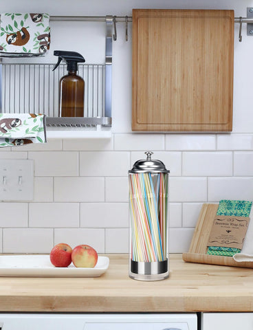 Biginiwa durable glass and stainless steel construction offers elegant, easy-to-clean storage.