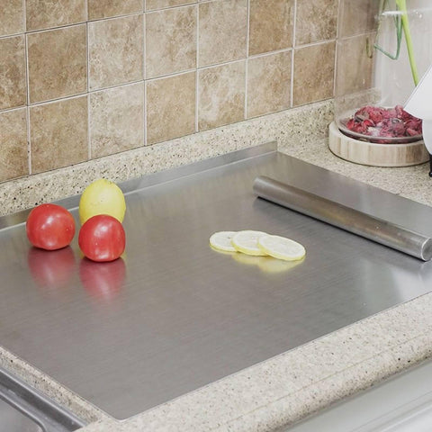 BILLAMB cutting board handles vegetables and fruits with ample surface area.