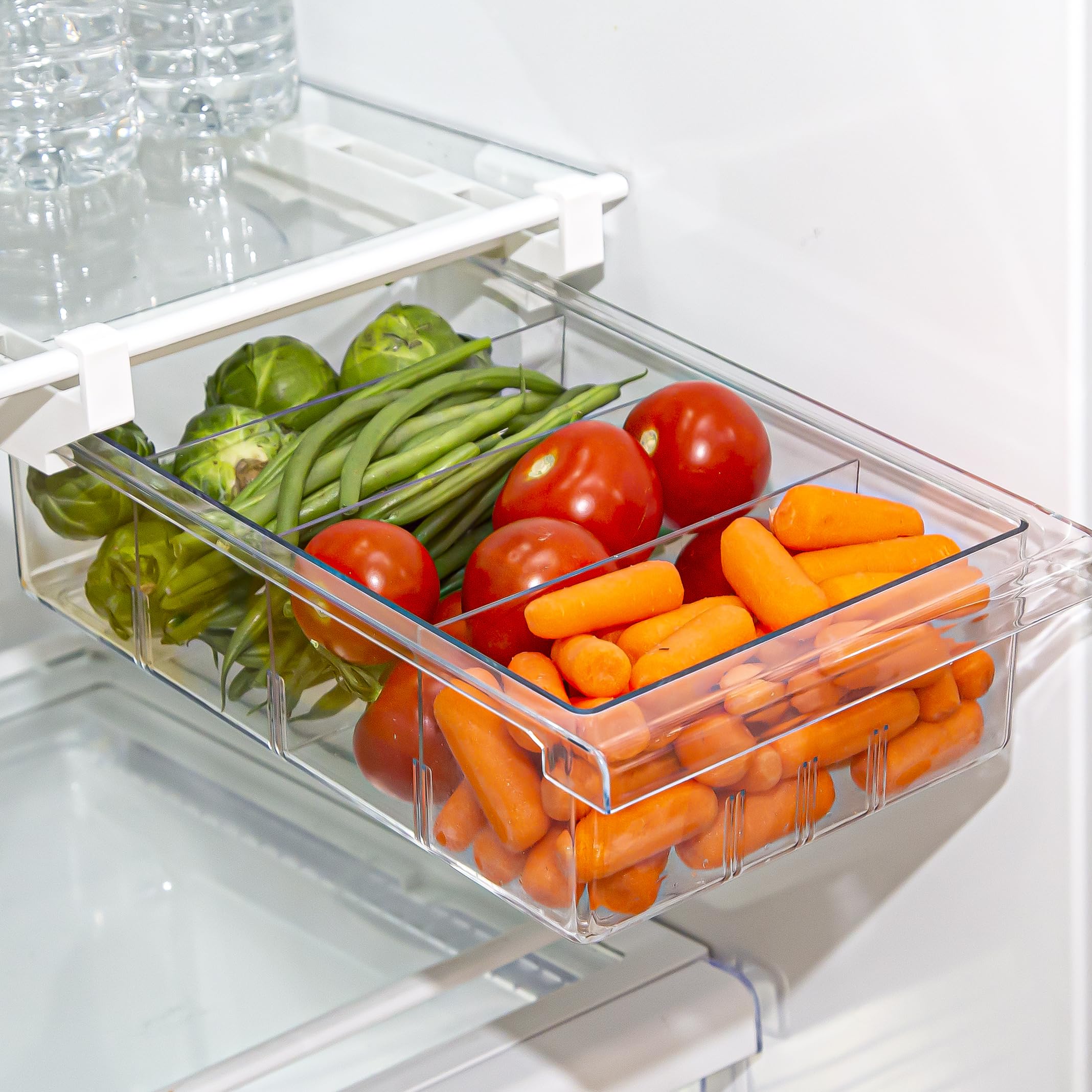 BINO pull-out fridge organizer main view shows organized storage for fruits and drinks.