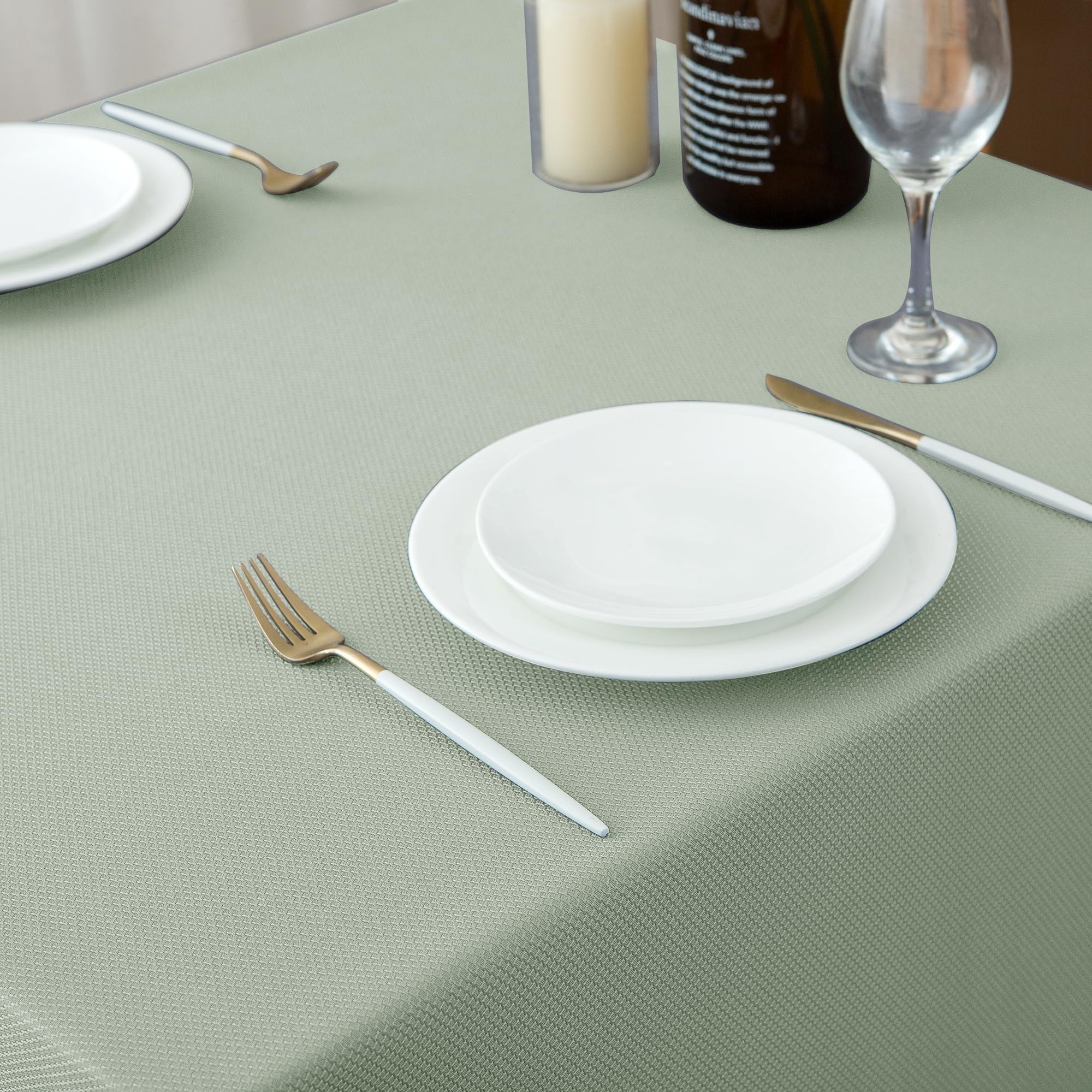 Biscaynebay family dining scene with sage card fabric tablecloth.