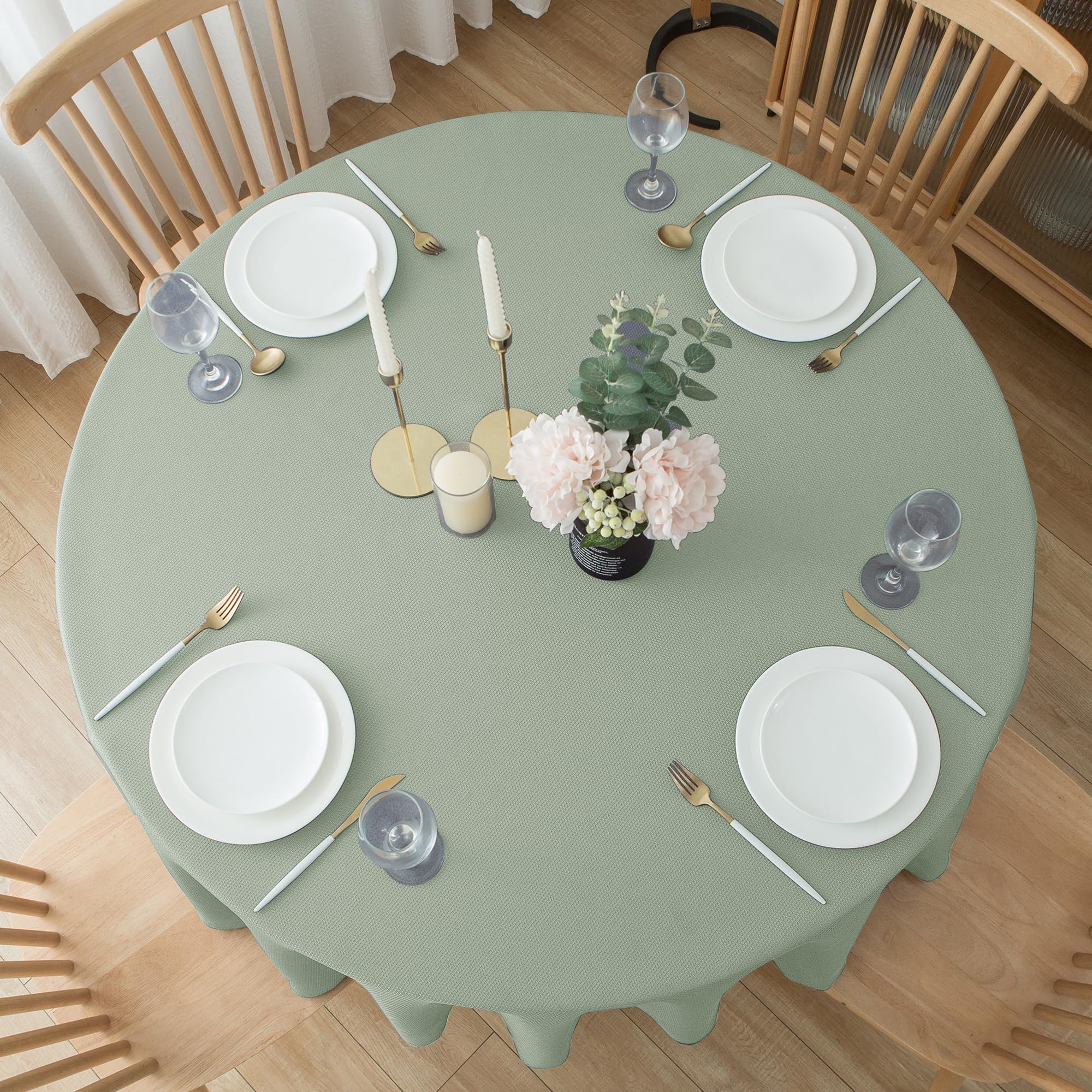 Biscaynebay outdoor dining setup with sage cloth creates elegant ambiance.