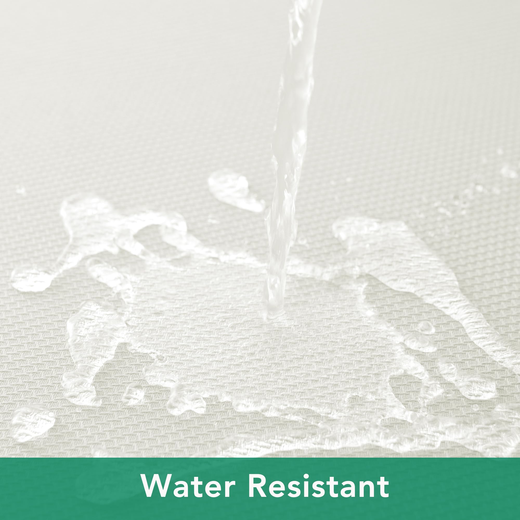 Biscaynebay 70-inch ivory tablecloth shows water beads on surface