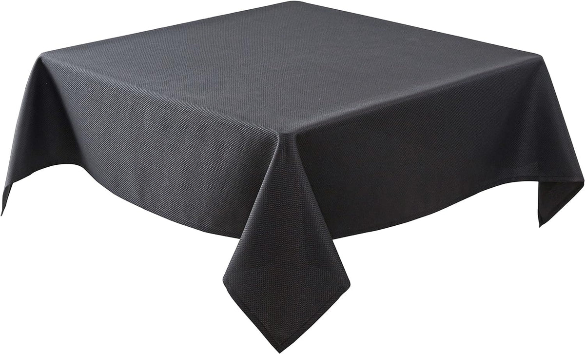 Biscaynebay textured tablecloth on dining table with elegant black fabric
