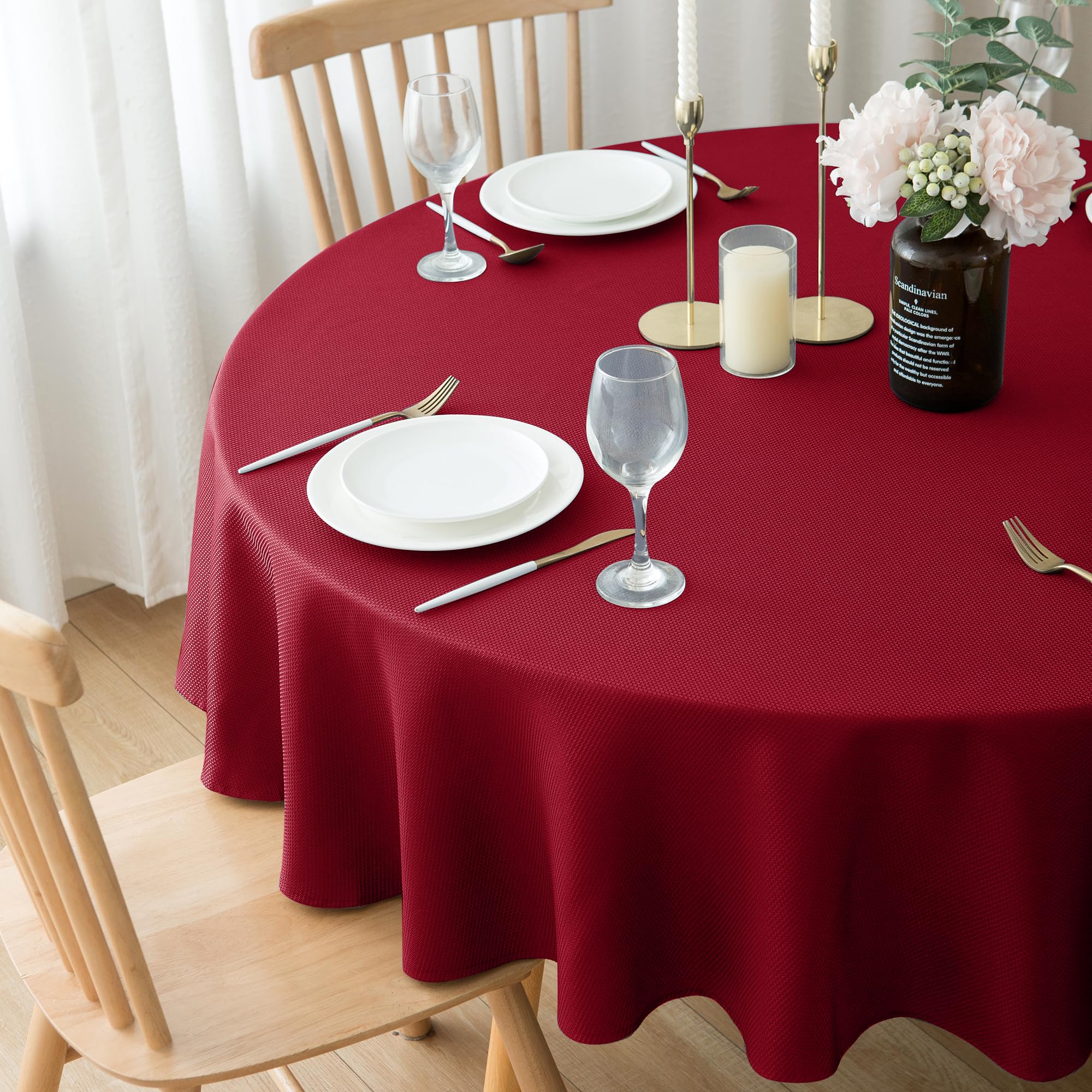 Biscaynebay wedding party round red tablecloth adds refined ambiance.