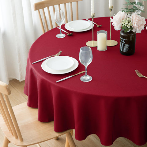 Biscaynebay wedding party round red tablecloth adds refined ambiance.