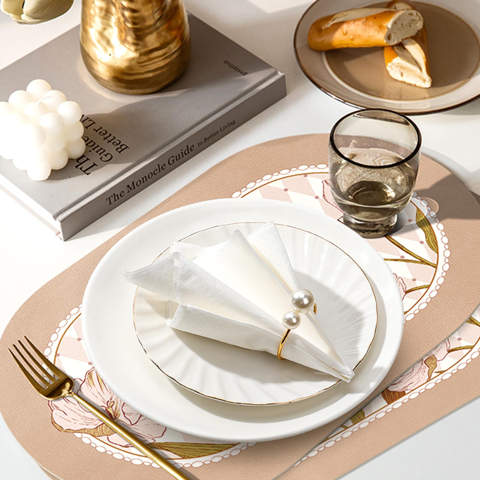 Bituinra pearl-embellished napkin rings add a refined dining touch.
