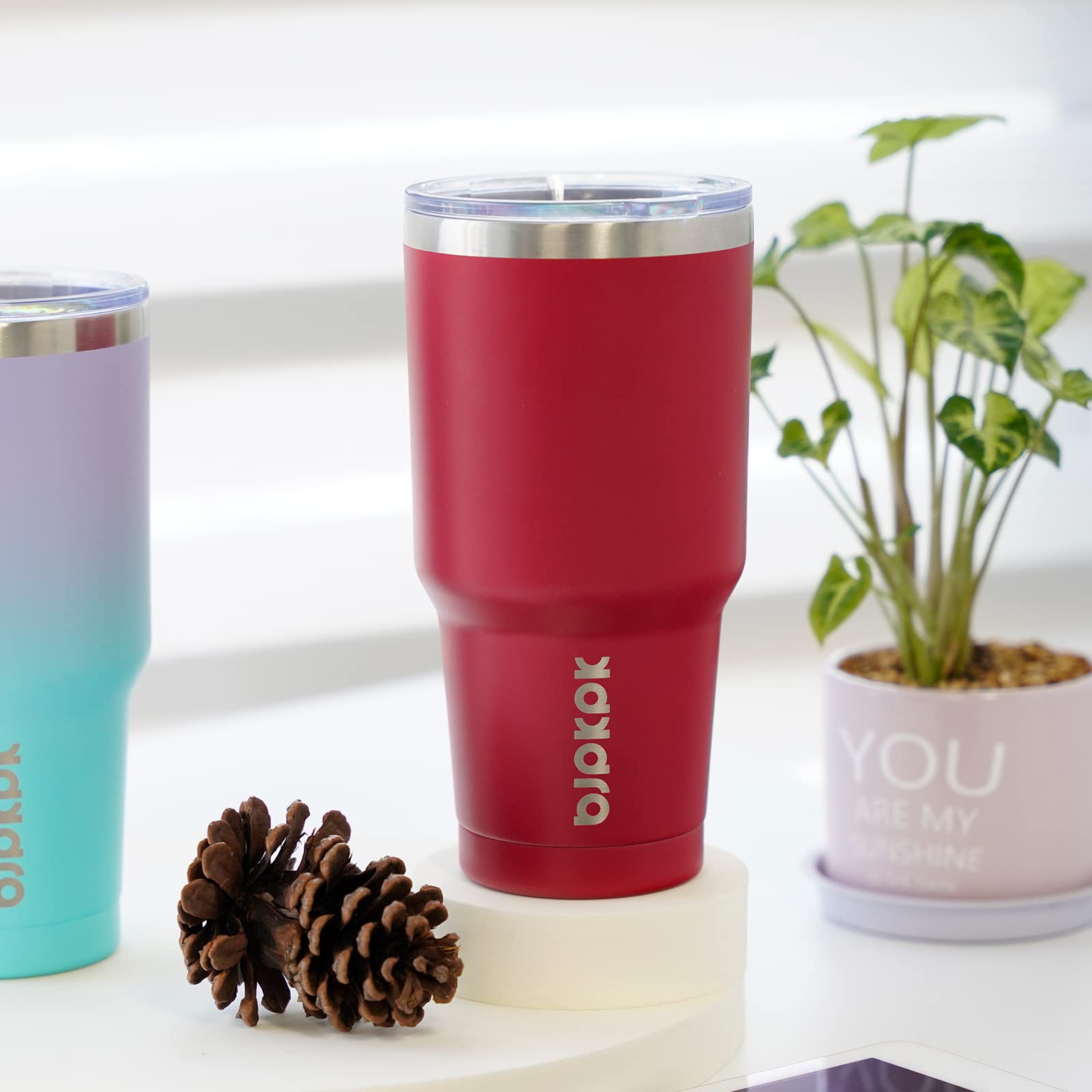 Sipping lid on BJPKPK tumbler allows easy drinking without spills