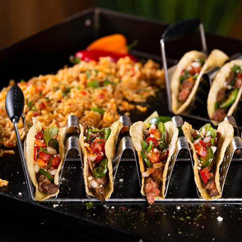 BLACKSTONE taco holder stand with heat resistant handles for easy transport.