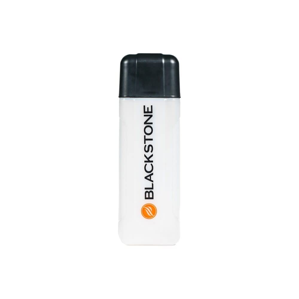 Blackstone culinary squeeze bottle on grill for drip-free marinades and glazes.