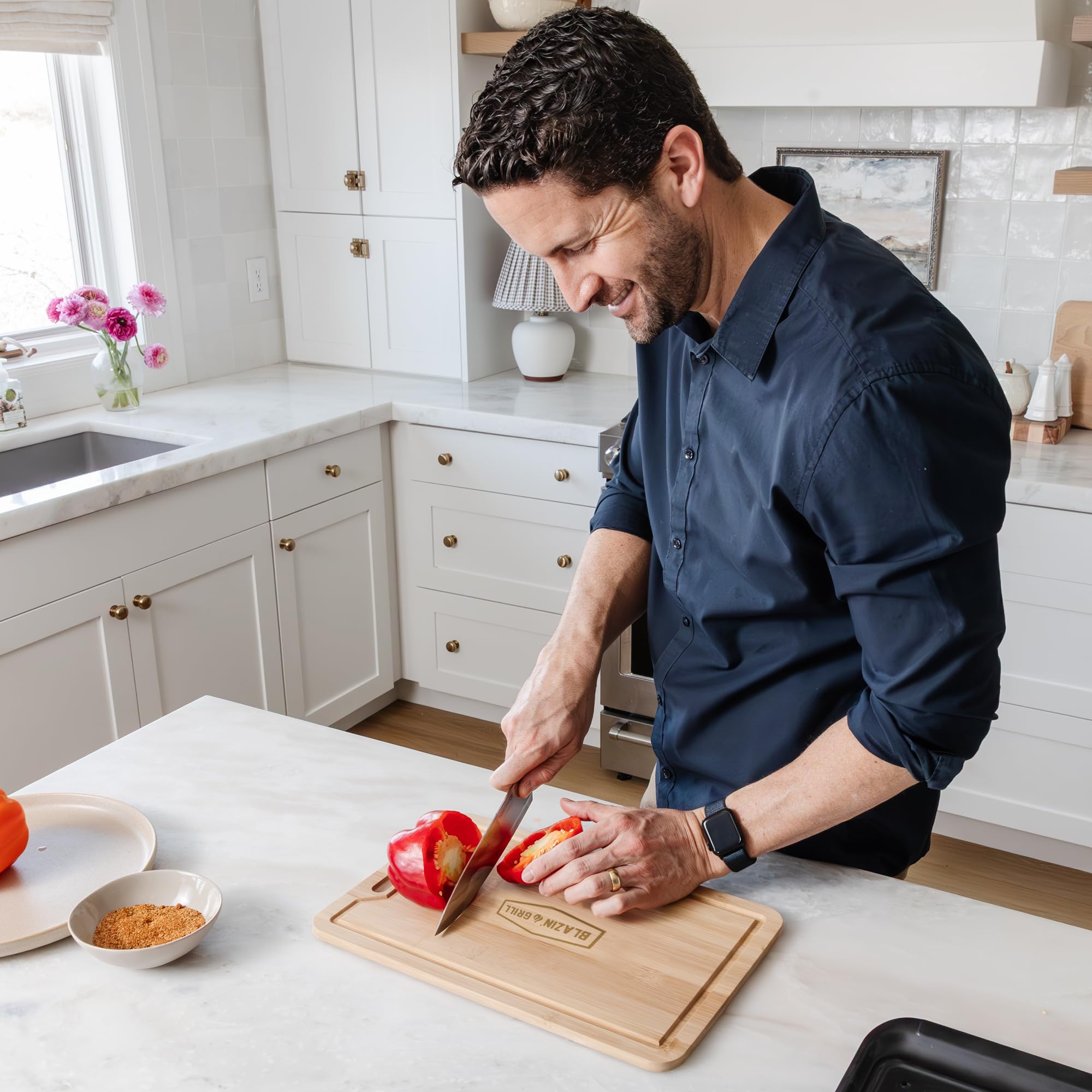 BLAZIN' GRILL bamboo cutting board provides a natural, knife-friendly surface.