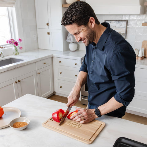 BLAZIN' GRILL bamboo cutting board provides a natural, knife-friendly surface.