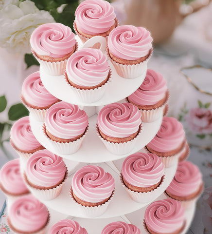 Blissur four-tier white cupcake stand in assembly stage for quick setup.