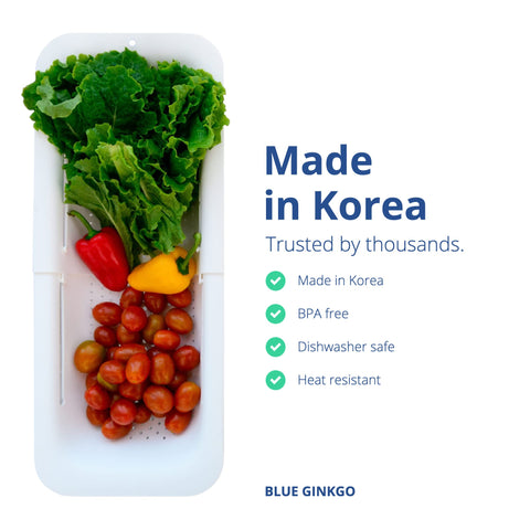 Blue Ginkgo extendable colander drains pasta without backflow.