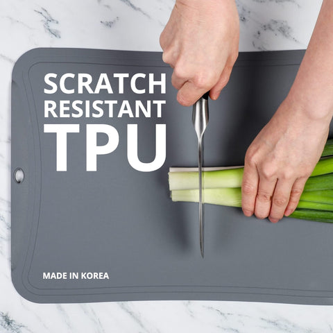 Blue Ginkgo TPU cutting mats large, ideal for chopping vegetables and herbs.