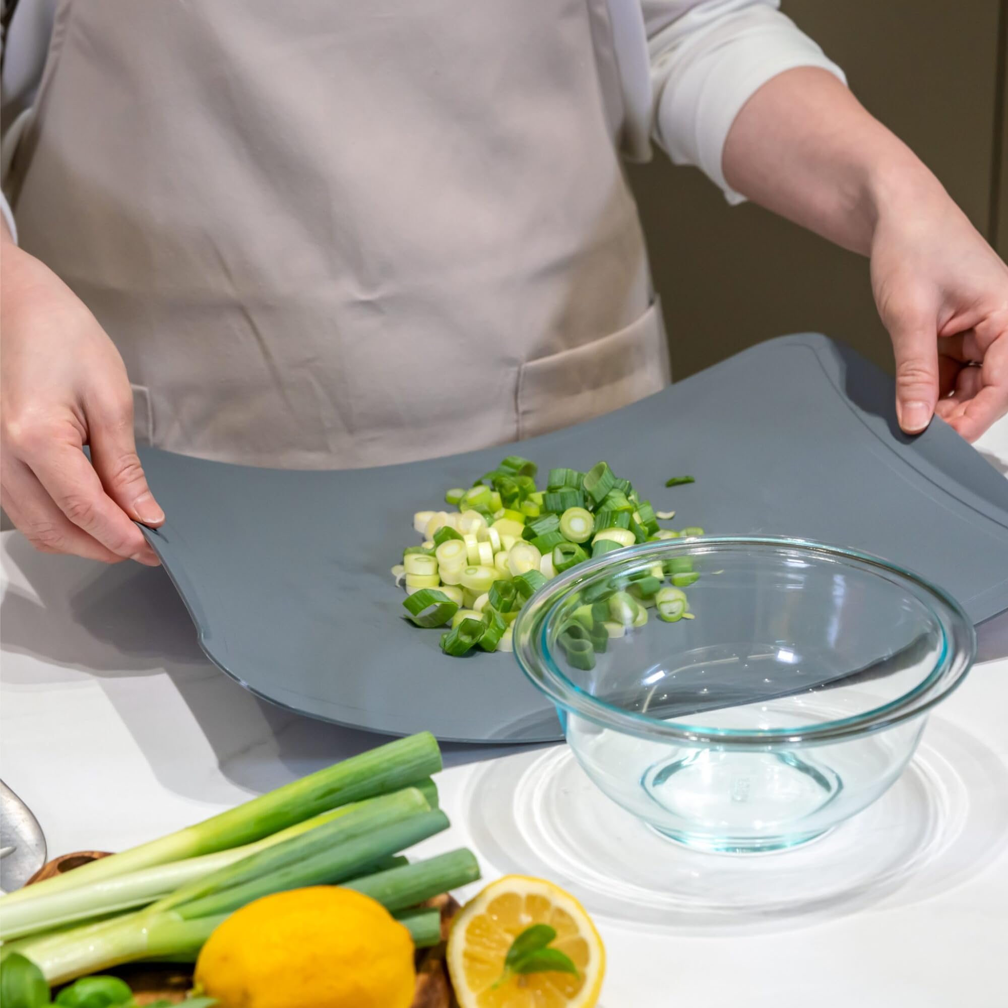Blue Ginkgo TPU cutting mats textured surface catches liquids efficiently.