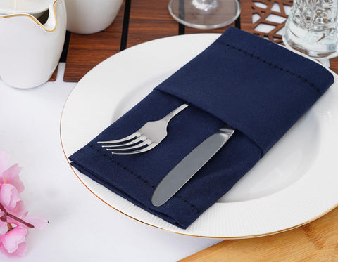 Blue Needles navy hemstitch 18x18 napkins in use at a family meal