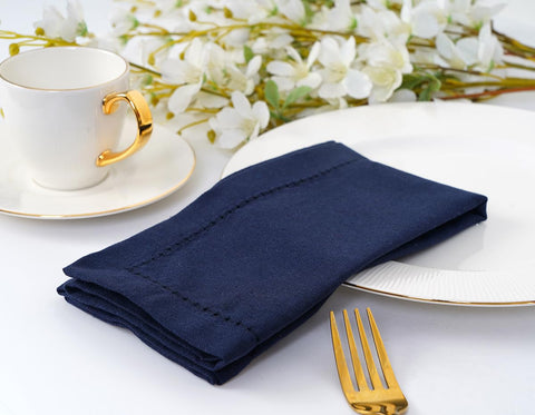 Blue Needles navy hemstitch napkins in washing machine showing easy care